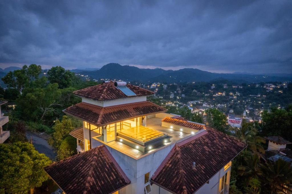 an overhead view of a building with lights on it at The Cloud Hanthana, Kandy in Kandy
