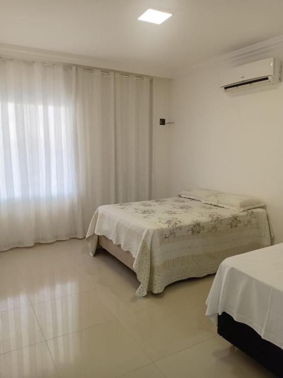 Ένα ή περισσότερα κρεβάτια σε δωμάτιο στο BJLAPA APART Residence