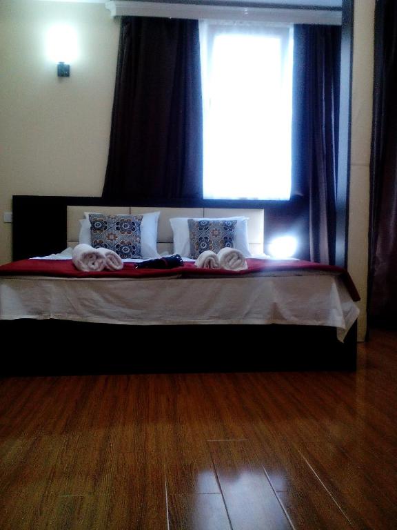 Postel nebo postele na pokoji v ubytování Hotel White Neptun Georgia Tbilisi