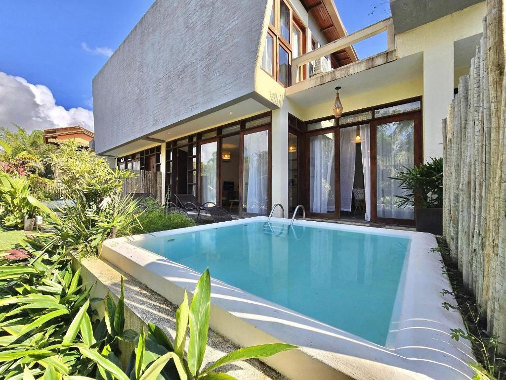 Πισίνα στο ή κοντά στο Casa em Taipu de Fora com Piscina - 100m da Praia