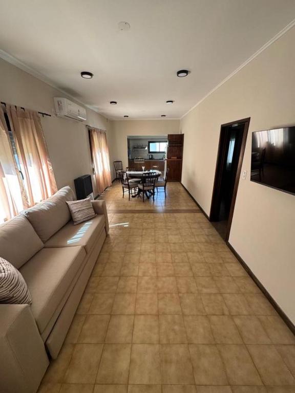 a living room with a couch and a table at Hotel Ideal Resto Bar in Colorado River
