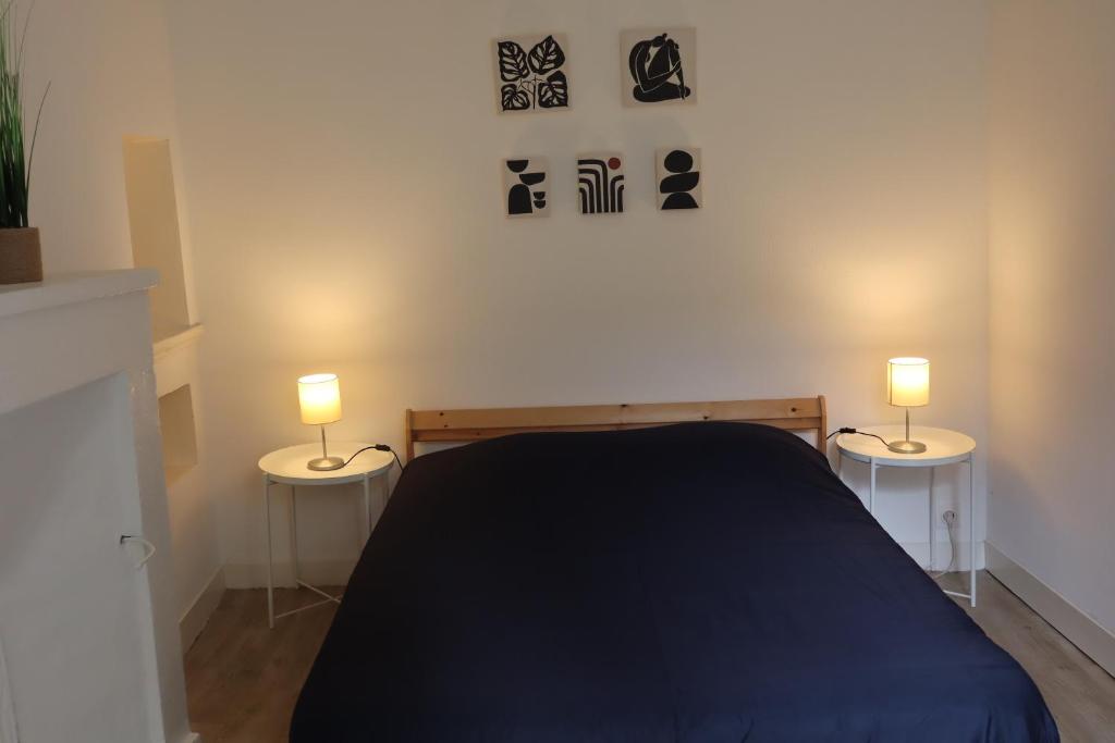 Postel nebo postele na pokoji v ubytování Charme et confort dans le centre-ville de Falaise quartier calme - Larès