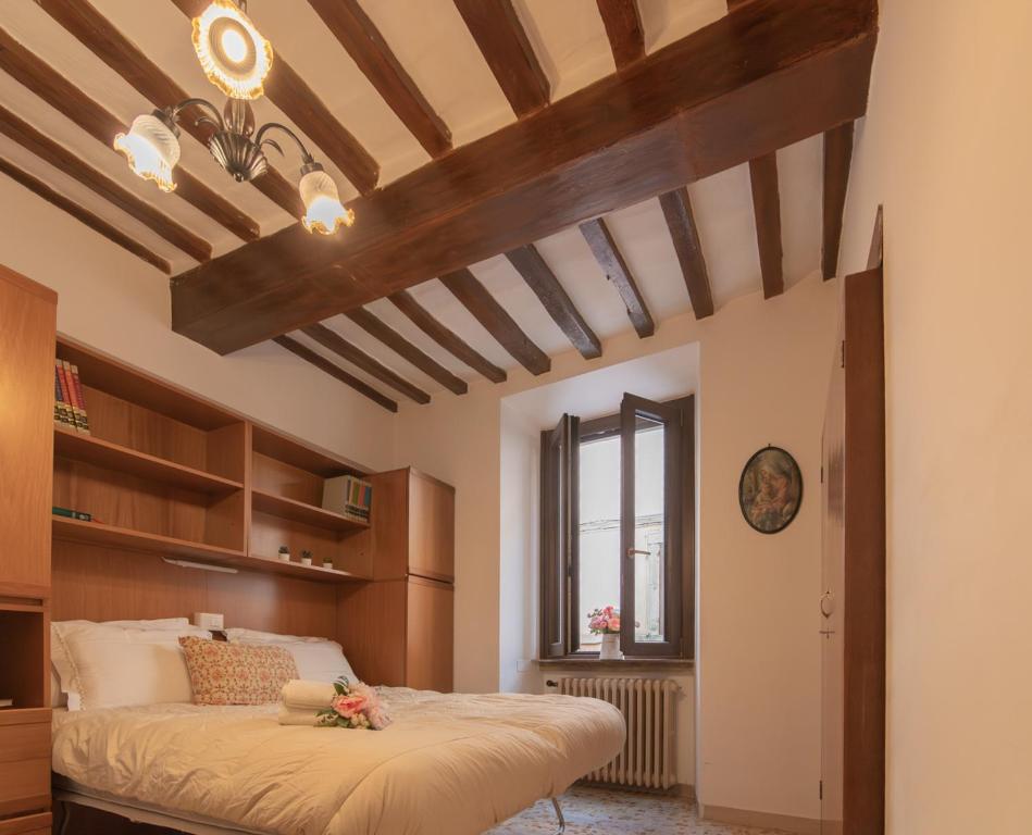 Postel nebo postele na pokoji v ubytování Appartamento Gubbio Vacanze