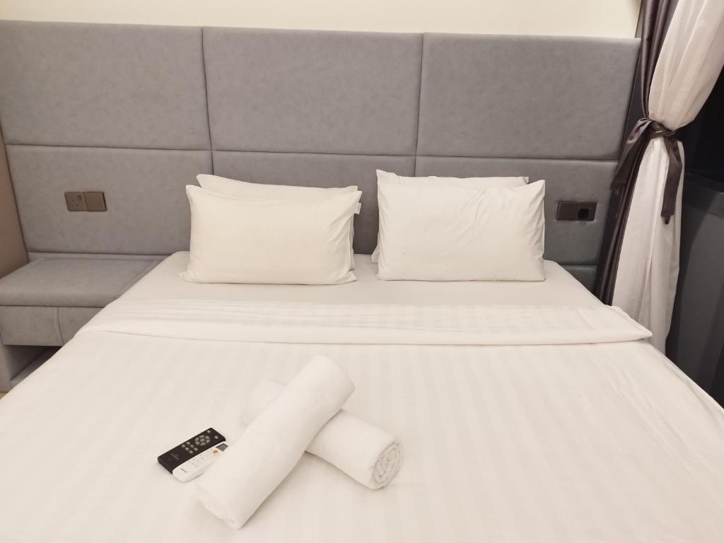 Ένα ή περισσότερα κρεβάτια σε δωμάτιο στο Casaluma STAR KLCC