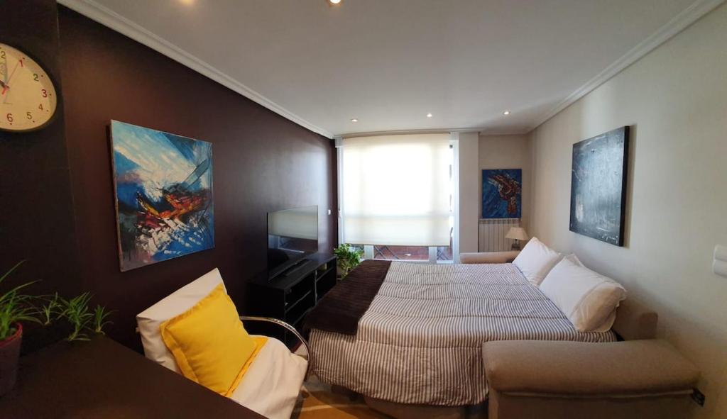 Ένα ή περισσότερα κρεβάτια σε δωμάτιο στο Beachfront Apartment