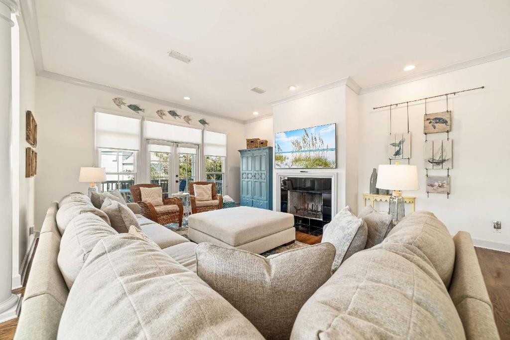 a large living room with a large couch at Sandy Gull Too in Orange Beach