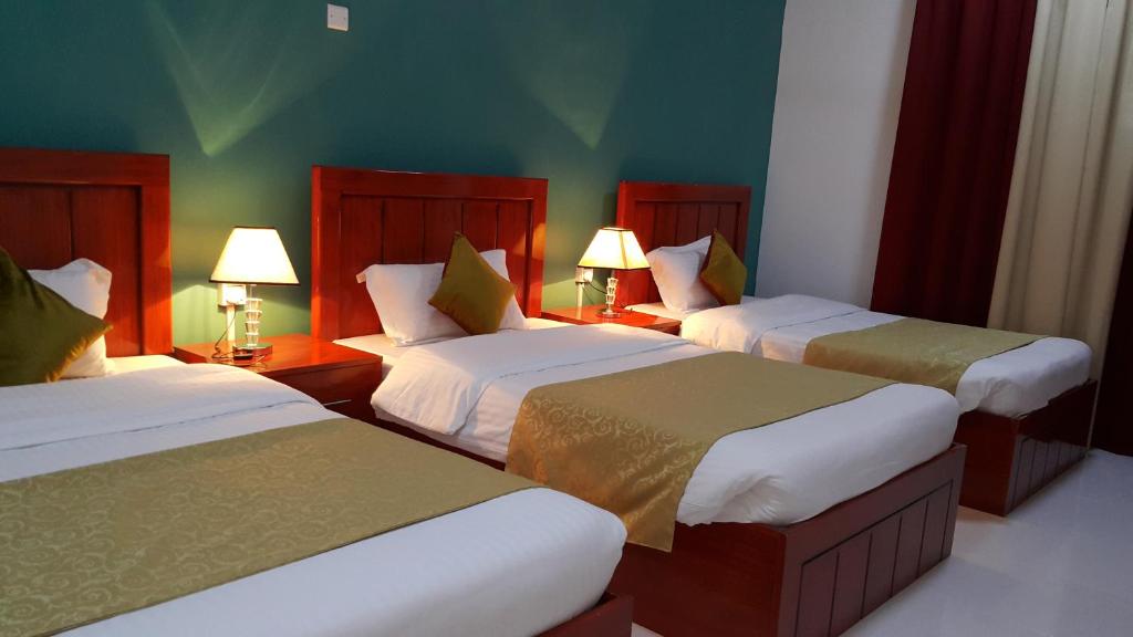 Al Karam Hotel Apartment - Dreibettzimmer