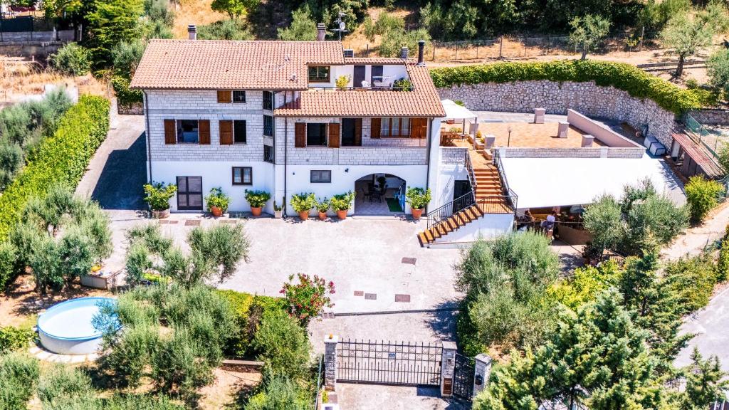 an aerial view of a house with a swimming pool at Villa Flora in Perugia