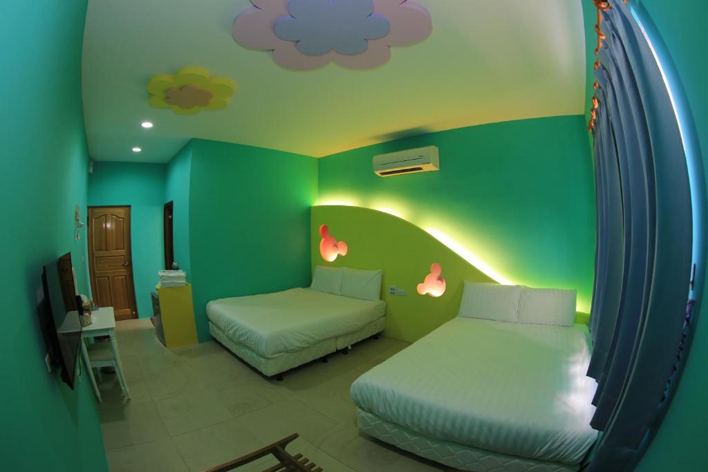 Postel nebo postele na pokoji v ubytování Happy B&B