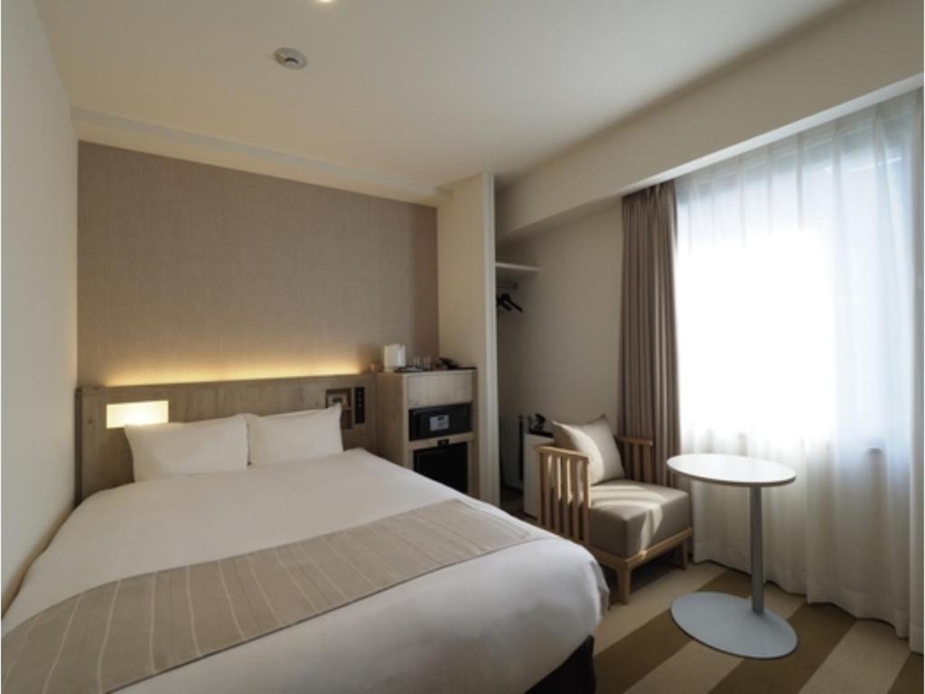 Giường trong phòng chung tại Far East Village Hotel Yokohama - Vacation STAY 27911v