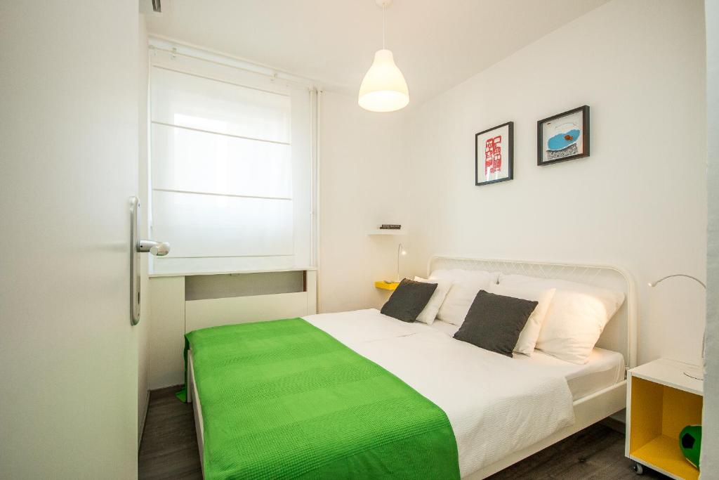 Posteľ alebo postele v izbe v ubytovaní Hendrix Bridge Apartment