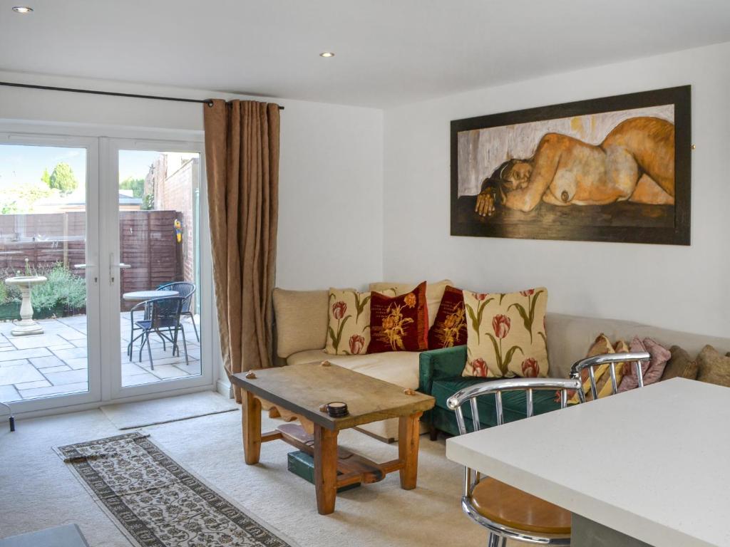 a living room with a couch and a table at Number Two in Bridlington