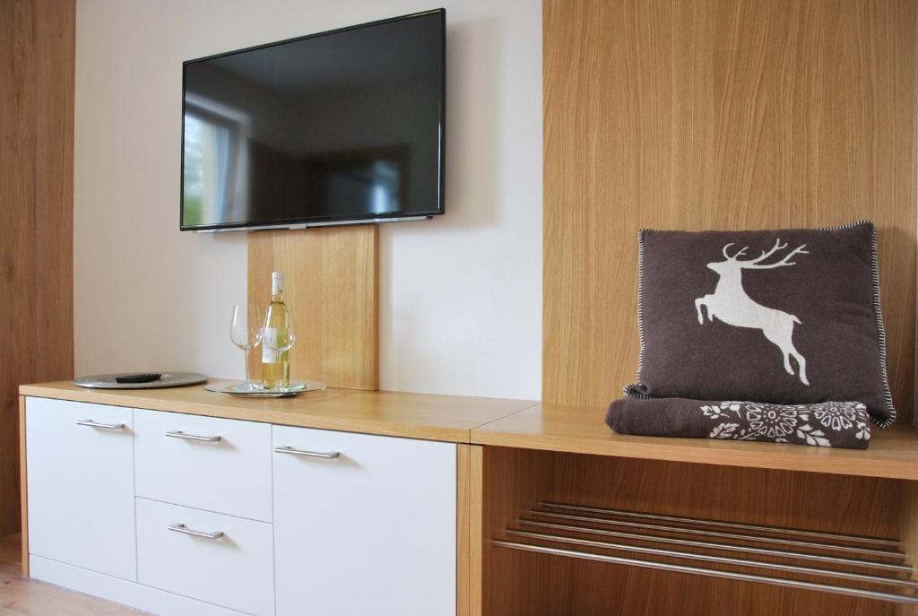 A television and/or entertainment centre at Haus Pflaum