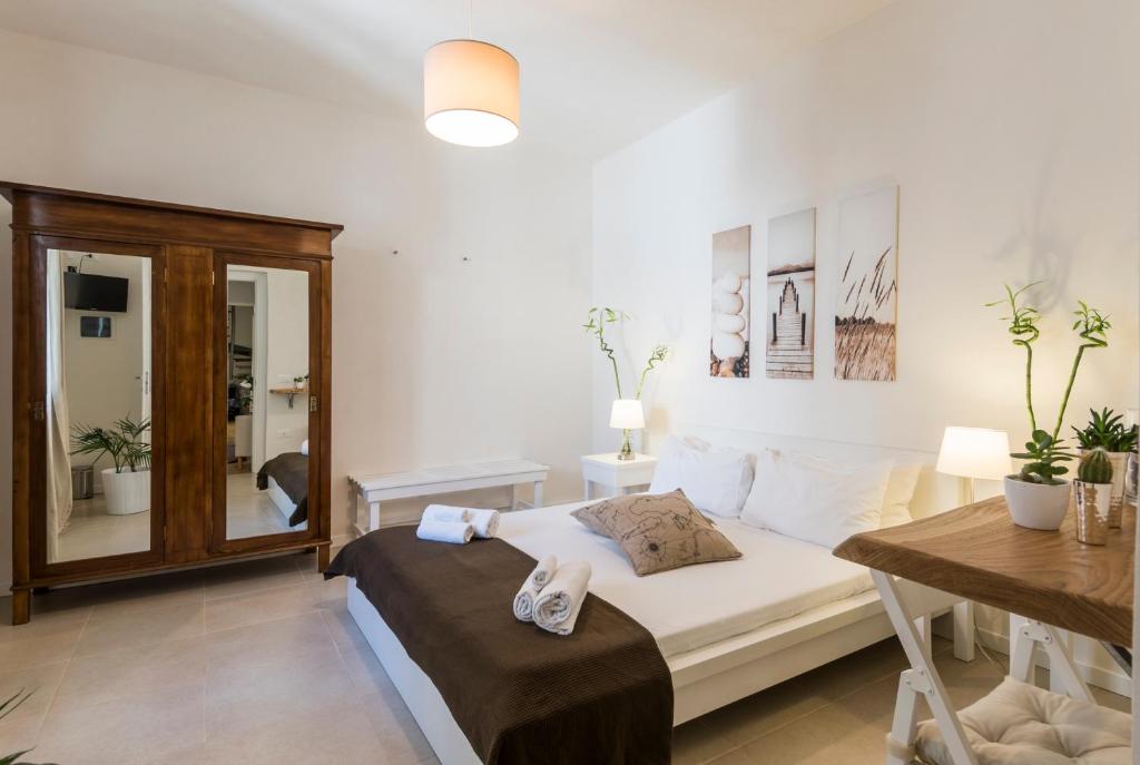 A bed or beds in a room at B&B Nonno Gino