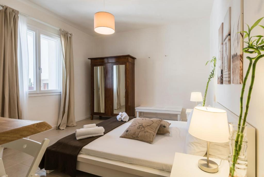 A bed or beds in a room at B&B Nonno Gino