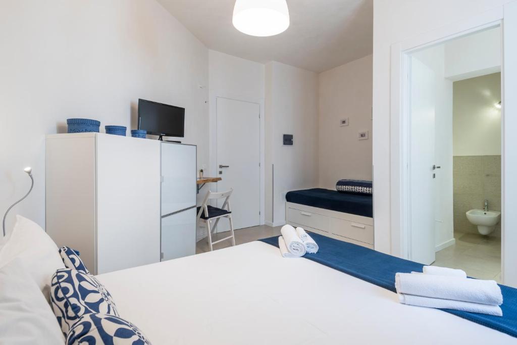 A bed or beds in a room at B&B Nonno Gino