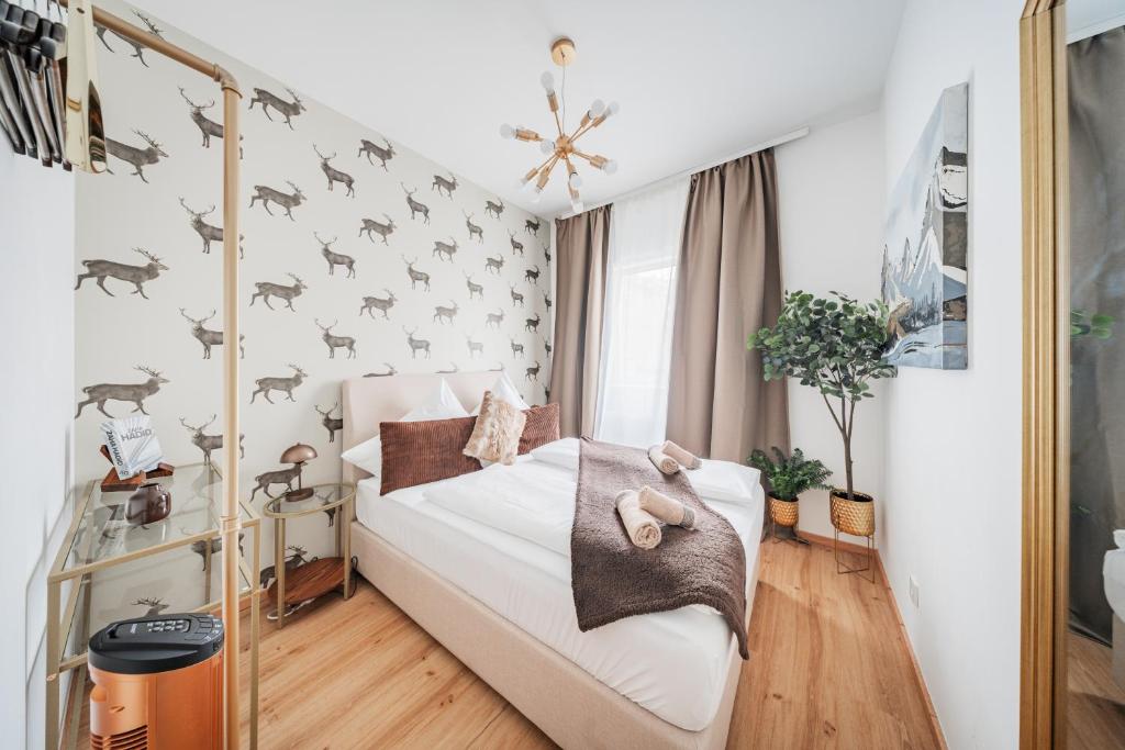 Postel nebo postele na pokoji v ubytování Peak by HOME1