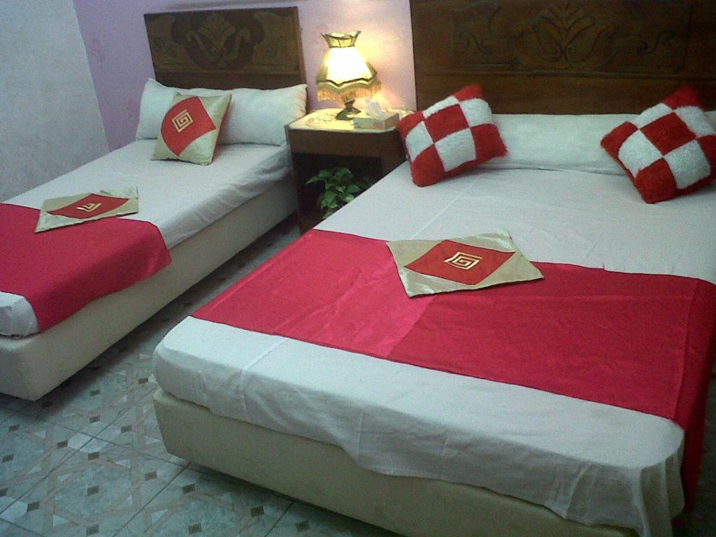 Postel nebo postele na pokoji v ubytování Cairo Moon Hostel