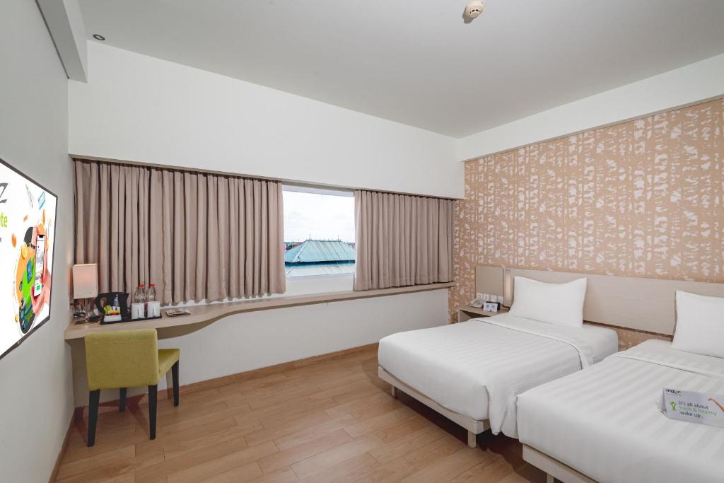 Whiz Prime Hotel Sudirman Cilacap - Deluxe Twin Room