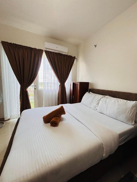 Ένα ή περισσότερα κρεβάτια σε δωμάτιο στο Contemporary City Suite with Relaxing Charm