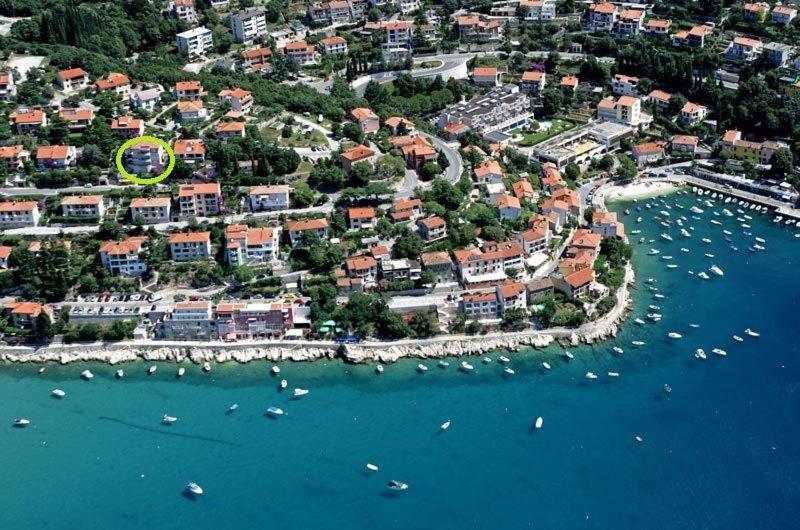 an aerial view of a harbor with boats in the water at Apartments Dunja in Rabac