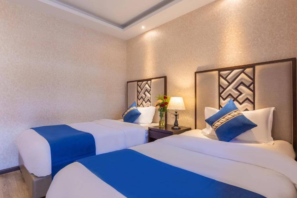 Katil atau katil-katil dalam bilik di daliyaweihotel