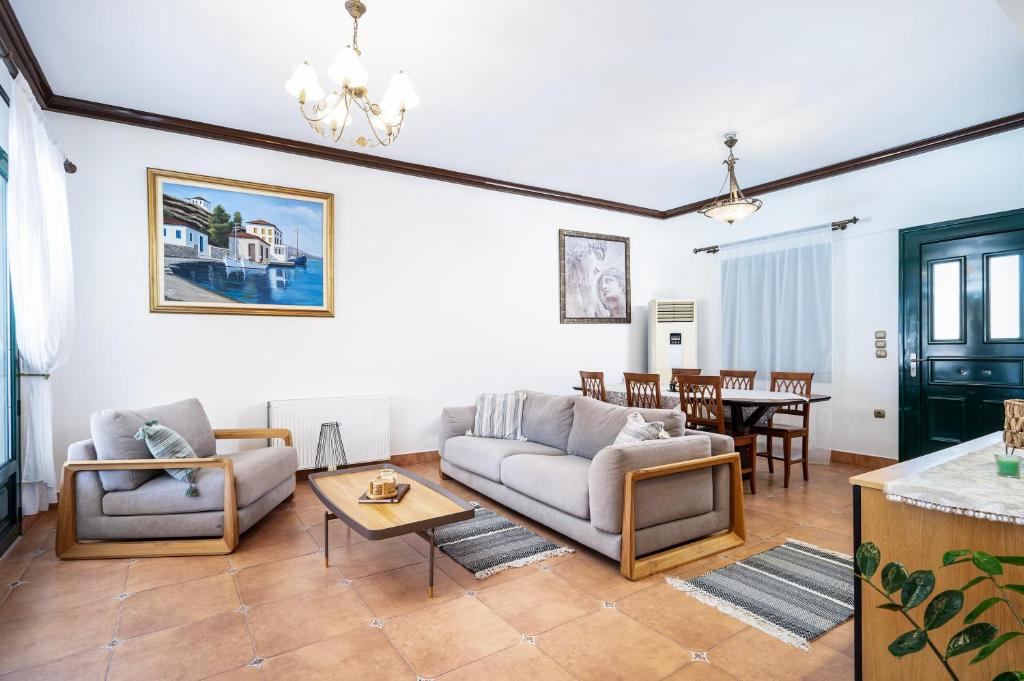 Χώρος καθιστικού στο Marys Beachfront Villa