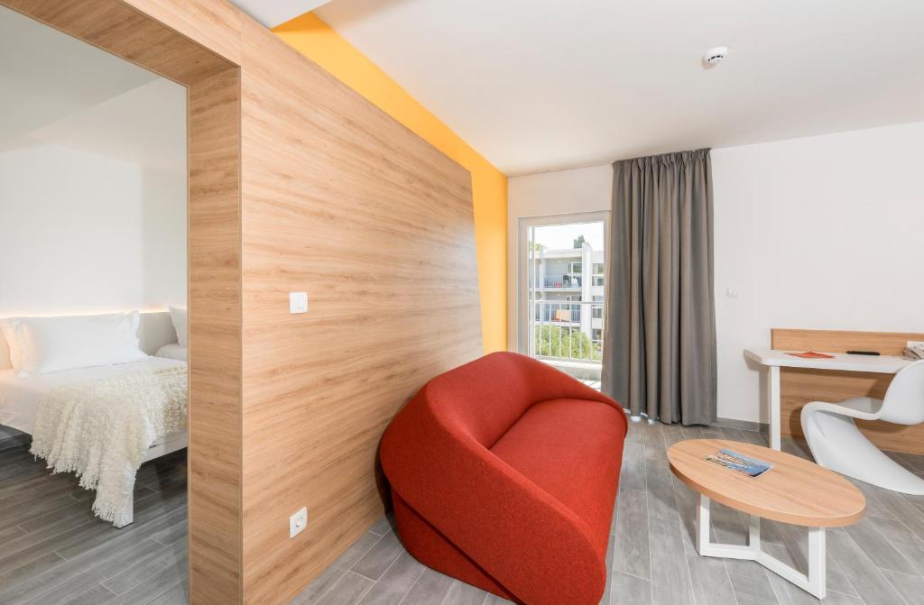 Postel nebo postele na pokoji v ubytování Pharos Hvar Bayhill Hotel