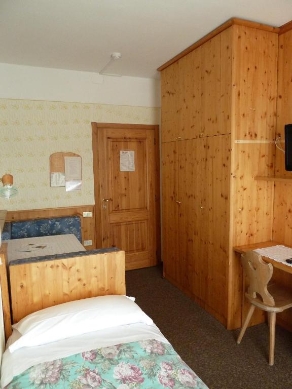 Postel nebo postele na pokoji v ubytování Hotel Rosa Resort