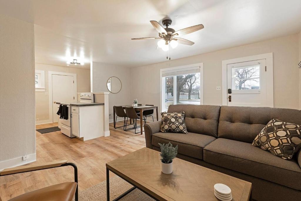 a living room with a couch and a table at Slant Streets Bungalow in Missoula