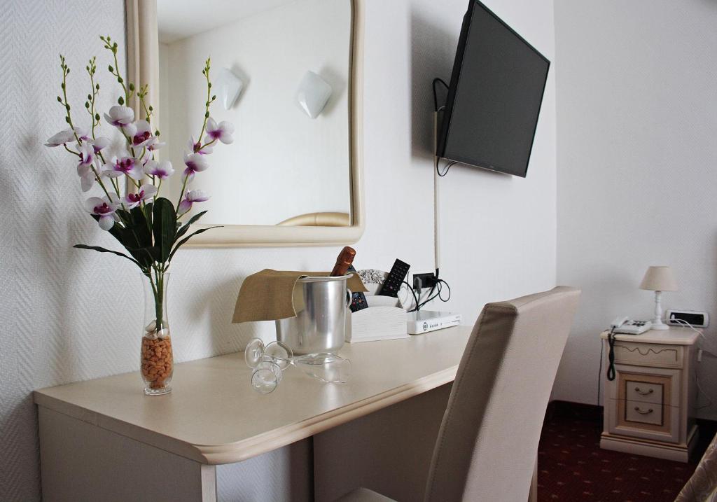 Telewizja i/lub zestaw kina domowego w obiekcie Hotel Centrale