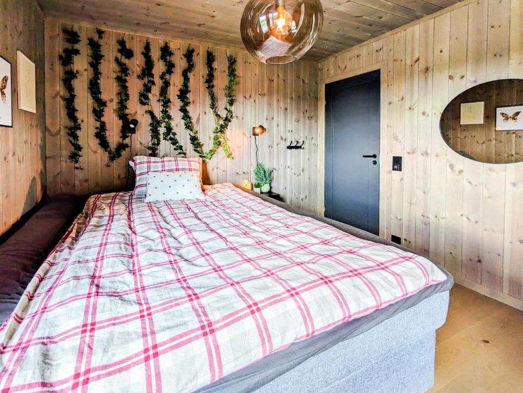 Ένα ή περισσότερα κρεβάτια σε δωμάτιο στο Spacious Familyabin With A View On Norefjell