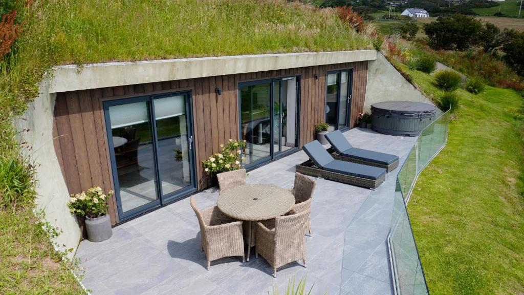 an aerial view of a patio with a table and chairs at The Willow Hill in Aberdyfi