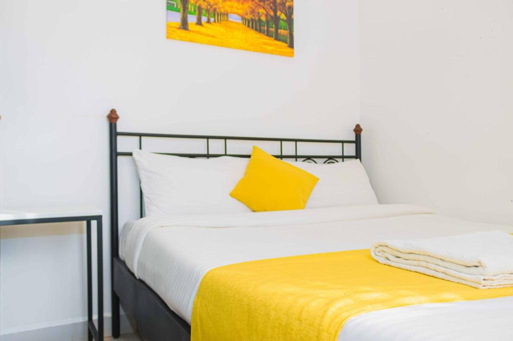 Una cama o camas en una habitación de Nanyuki Mostays