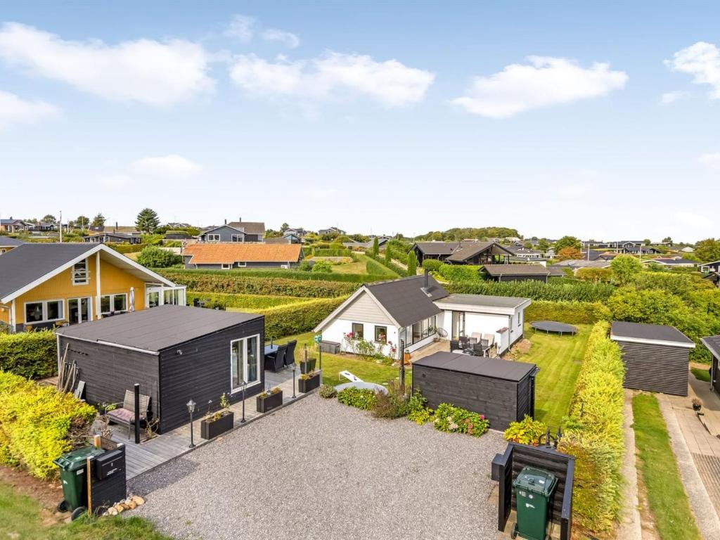 an aerial view of a house with a yard at Holiday Home Arnia - 250m from the sea by Interhome in Hejlsminde