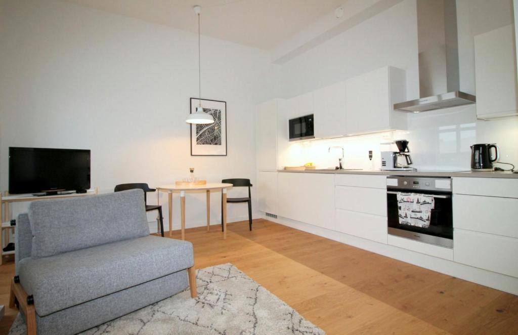 Η κουζίνα ή μικρή κουζίνα στο Central Apartment for 4