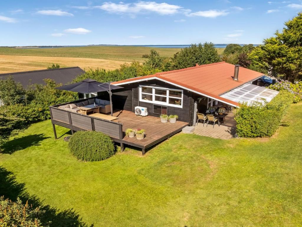 an overhead view of a tiny house with a deck at Holiday Home Berner - 500m to the fjord by Interhome in Flovtrup