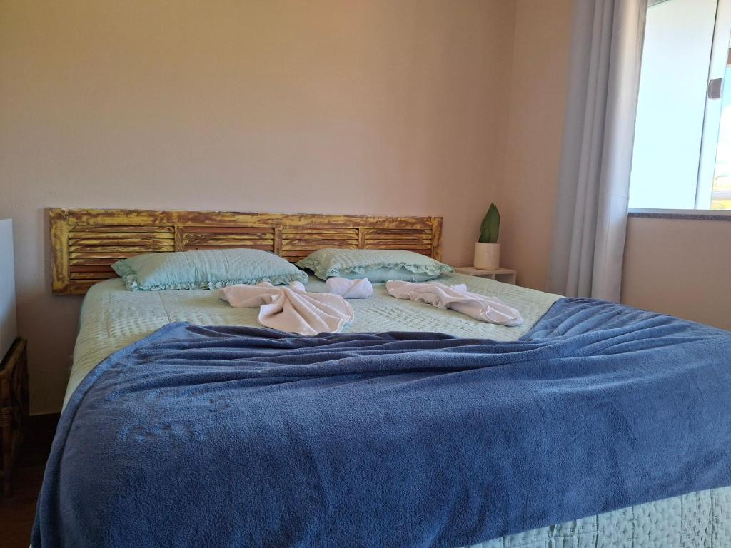 Postel nebo postele na pokoji v ubytování Suíte Casa de luz-Lar na Serra-Individual ou Duplo-N6