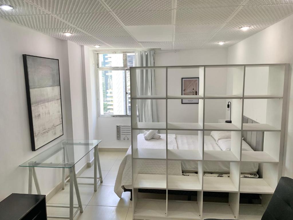 Een bed of bedden in een kamer bij Centro - Ao lado da Lapa