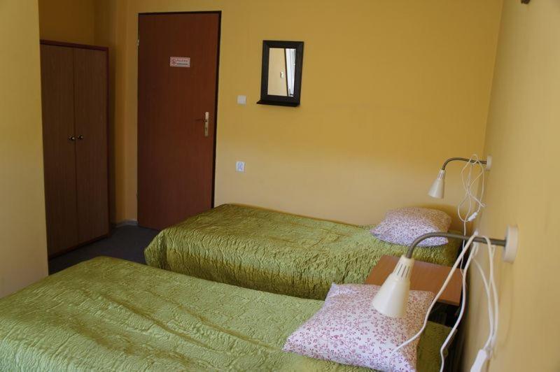 Posteľ alebo postele v izbe v ubytovaní Nest Nocleg Poznań