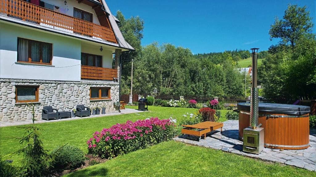 Κήπος έξω από το Apartamenty u Basi