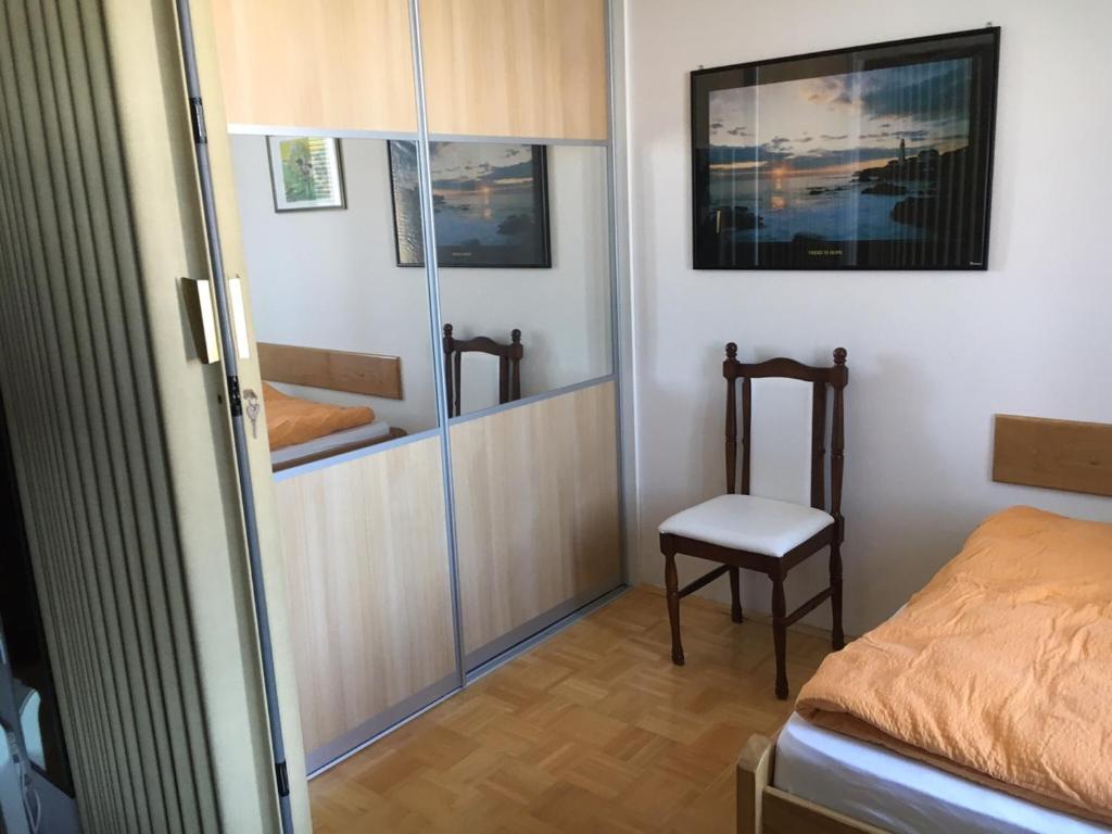 Postel nebo postele na pokoji v ubytování Apartment Dubravka I