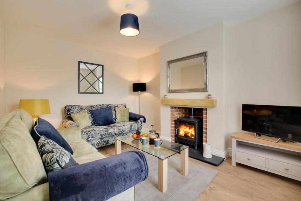 Et opholdsområde på Holly Tree Cottage