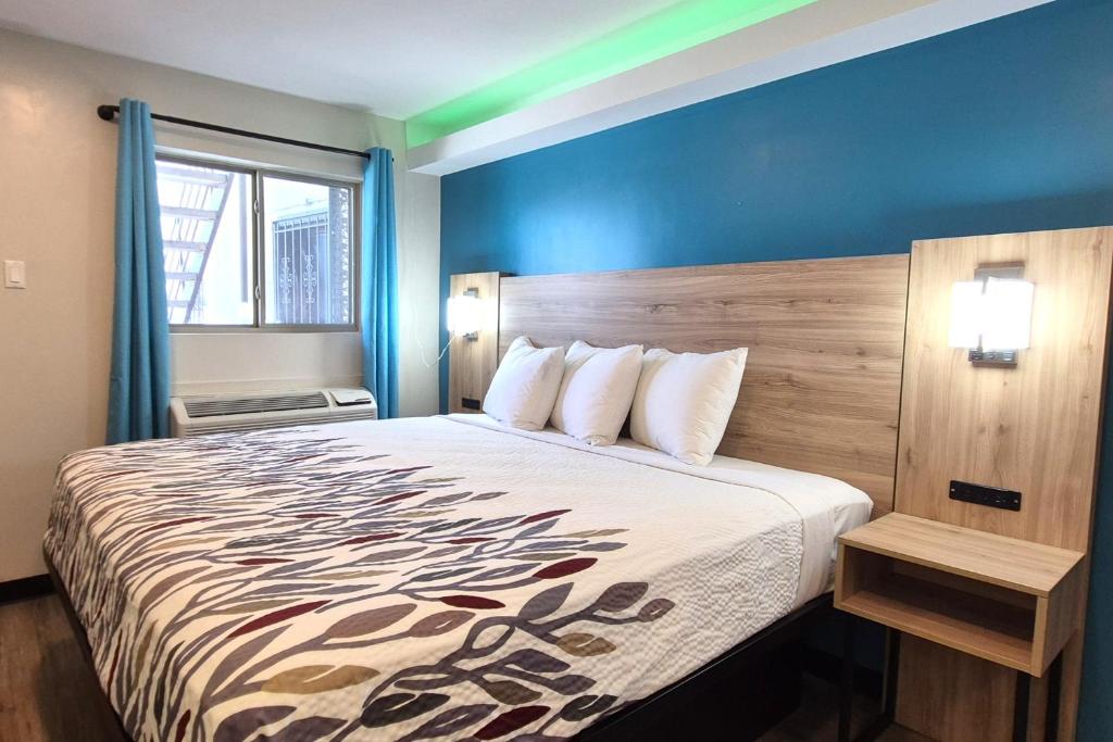 Exclusivo Inn by OYO Grand Prairie, TX - Lit King Avec Kitchenette
