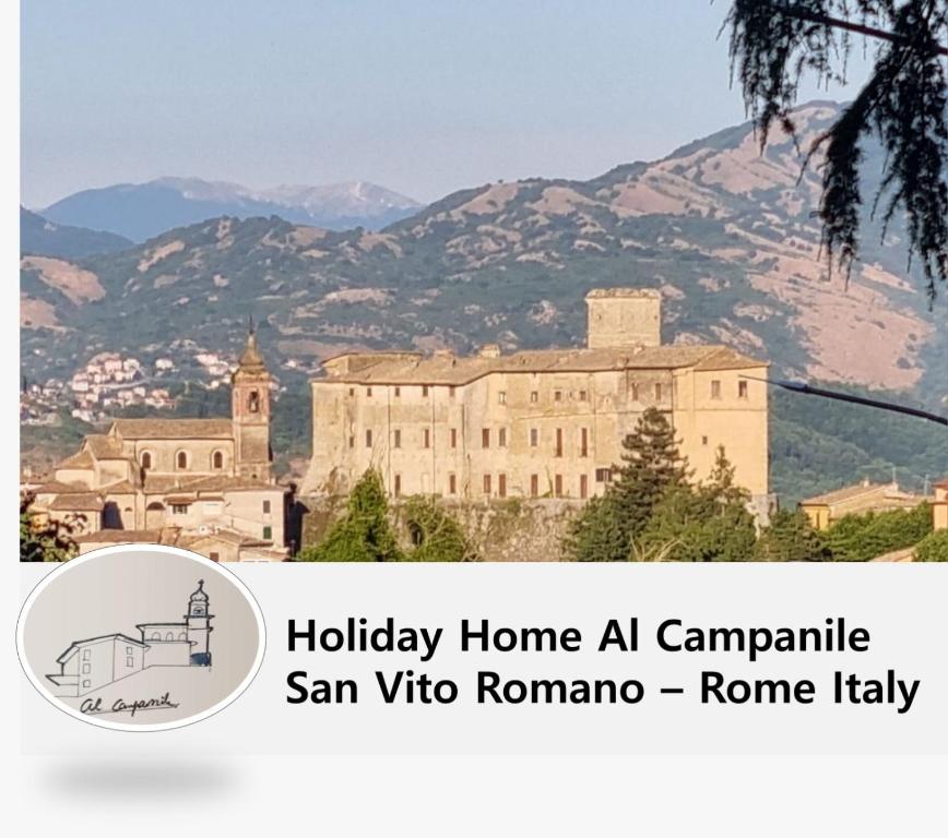 a view of a building with mountains in the background at Al Campanile a stylish new apartment San Vito Romano Rome in San Vito Romano