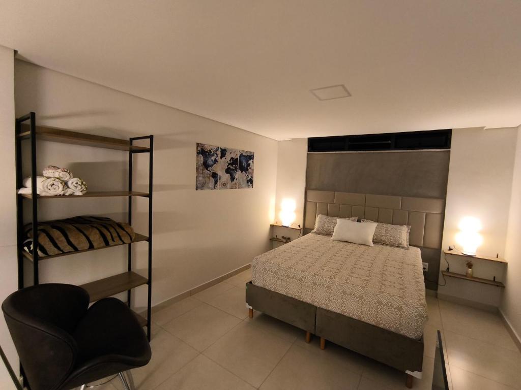 Postel nebo postele na pokoji v ubytování Loft Tavares