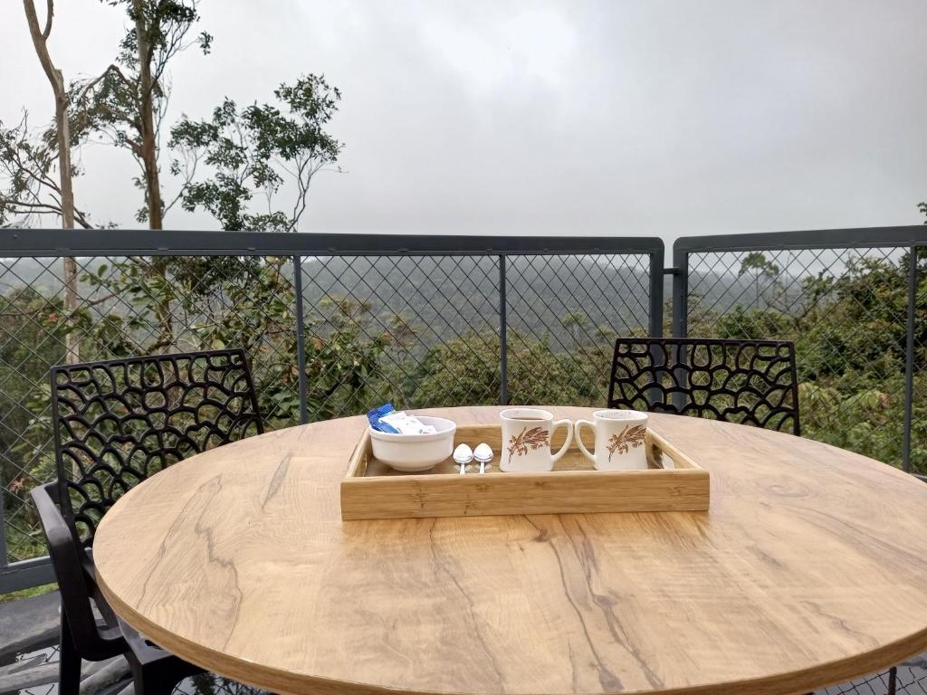 Afbeelding uit fotogalerij van The Fortunara Crown Munnar in Munnar