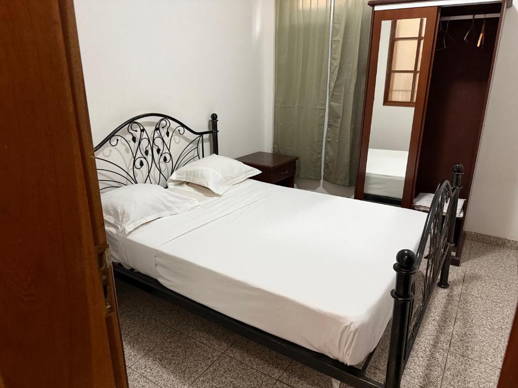 Katil atau katil-katil dalam bilik di Tata Apartamentos