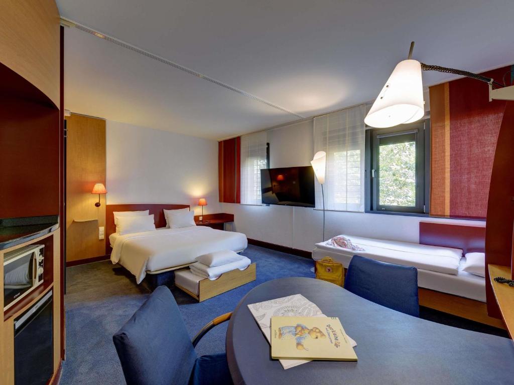 Novotel Suites München Parkstadt Schwabing - Resim 3