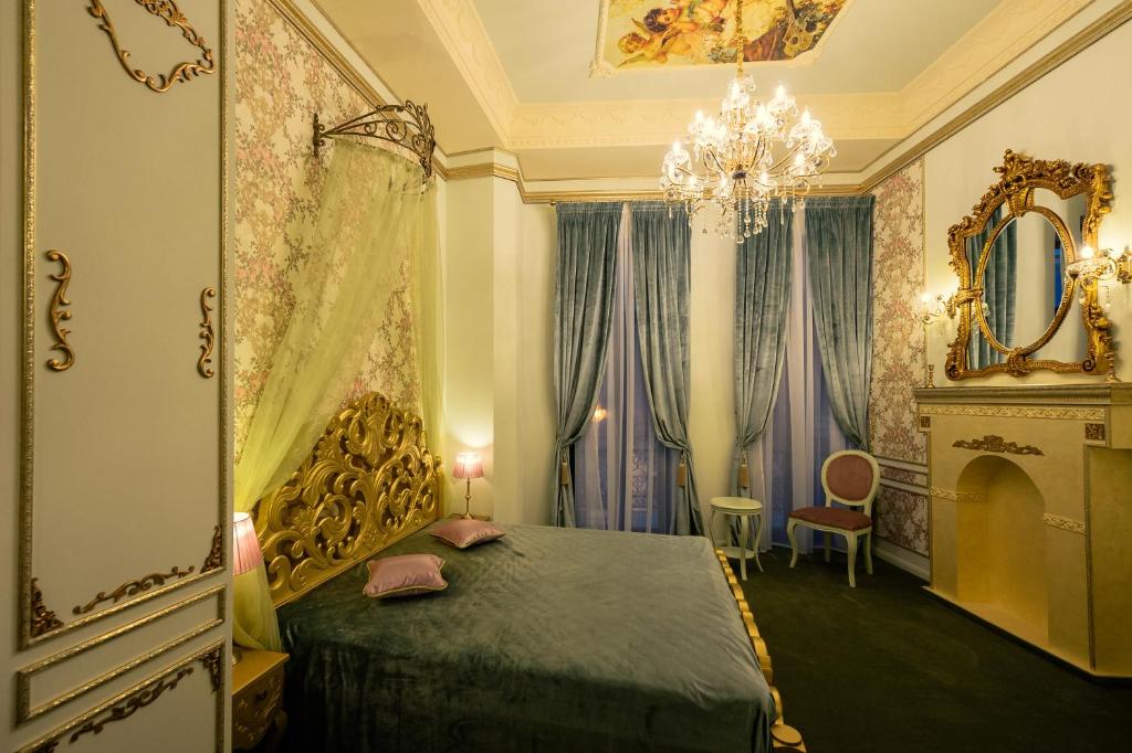 Кровать или кровати в номере Belle Epoque Boutique (Adult Only)